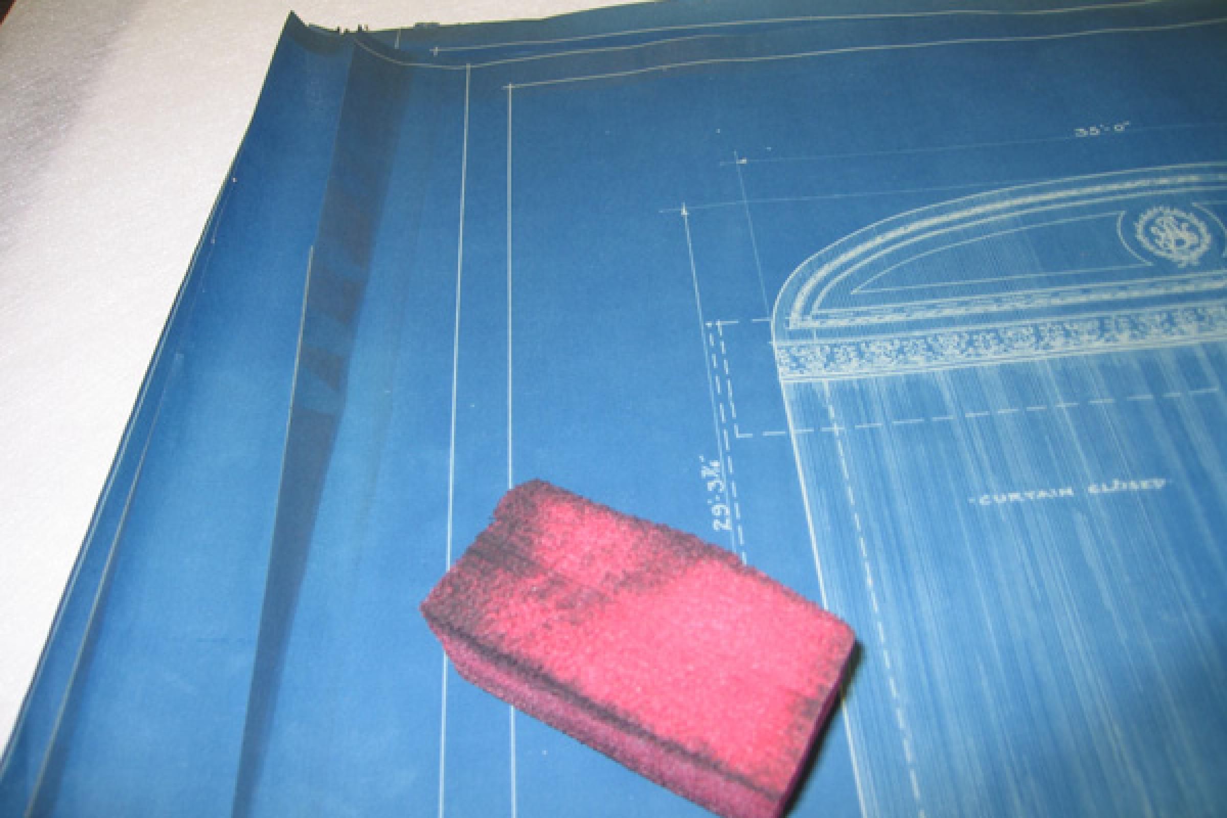 Smoke sponge and partially-cleaned blueprint