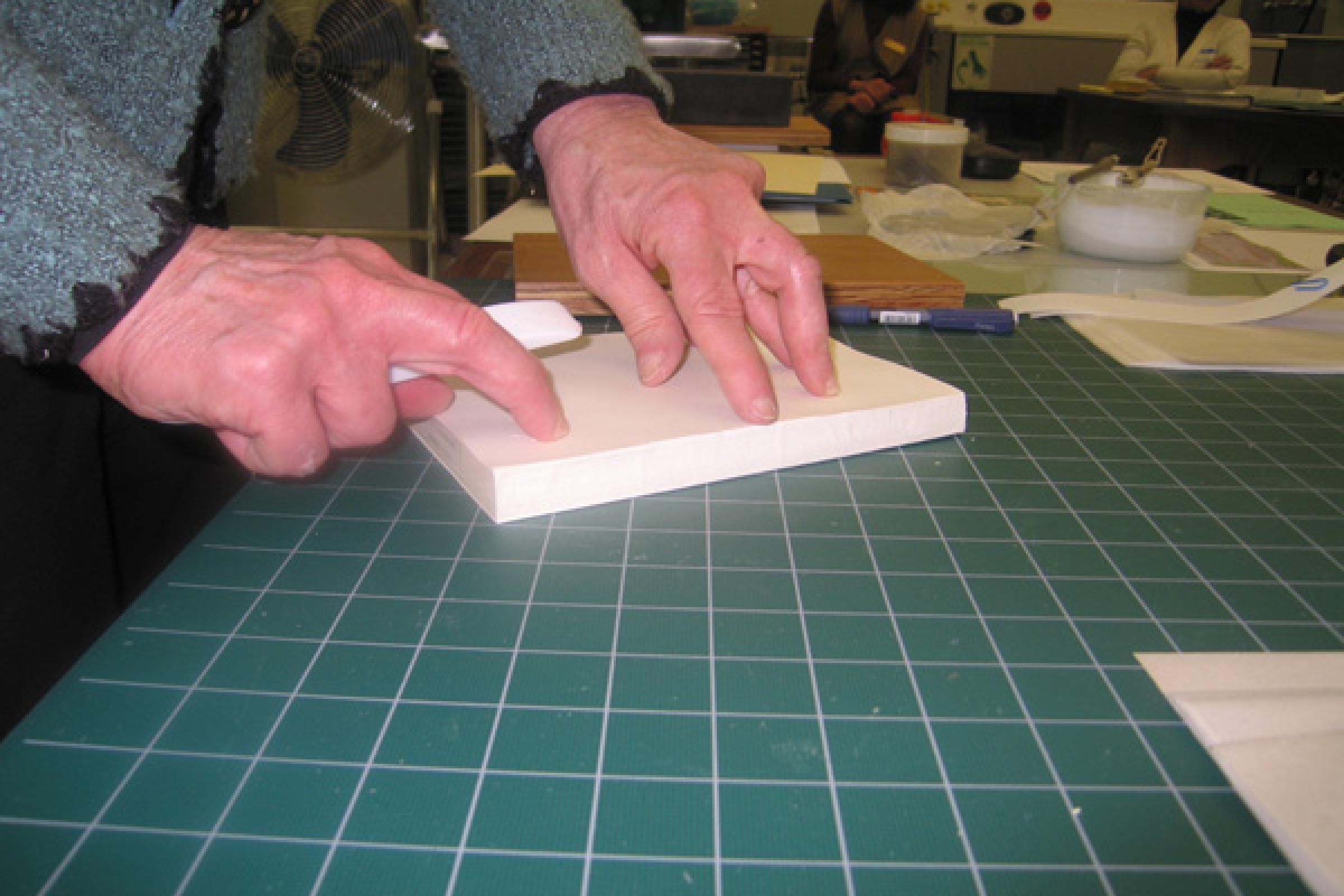A quick demonstration on fitting endpapers before students attempt the procedure...