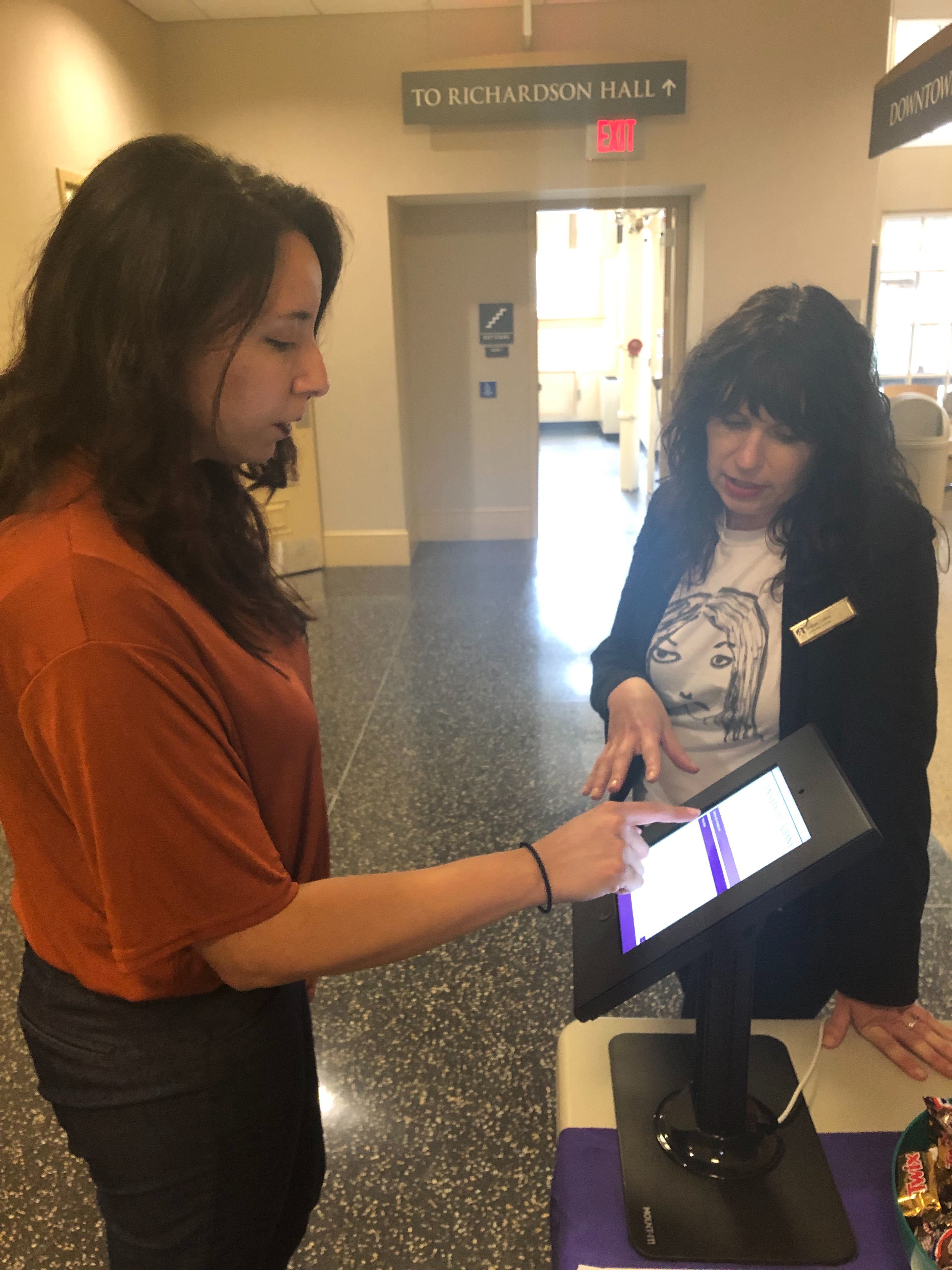 Students sign up for the Student Advisory Board at the Dewey Welcome Back Event