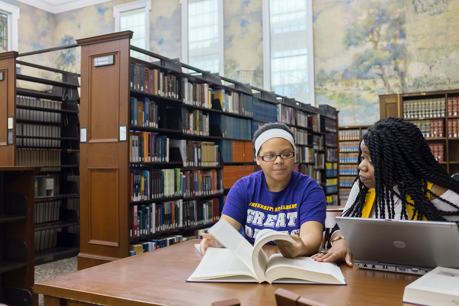  Students use library resources at the Dewey Graduate Library