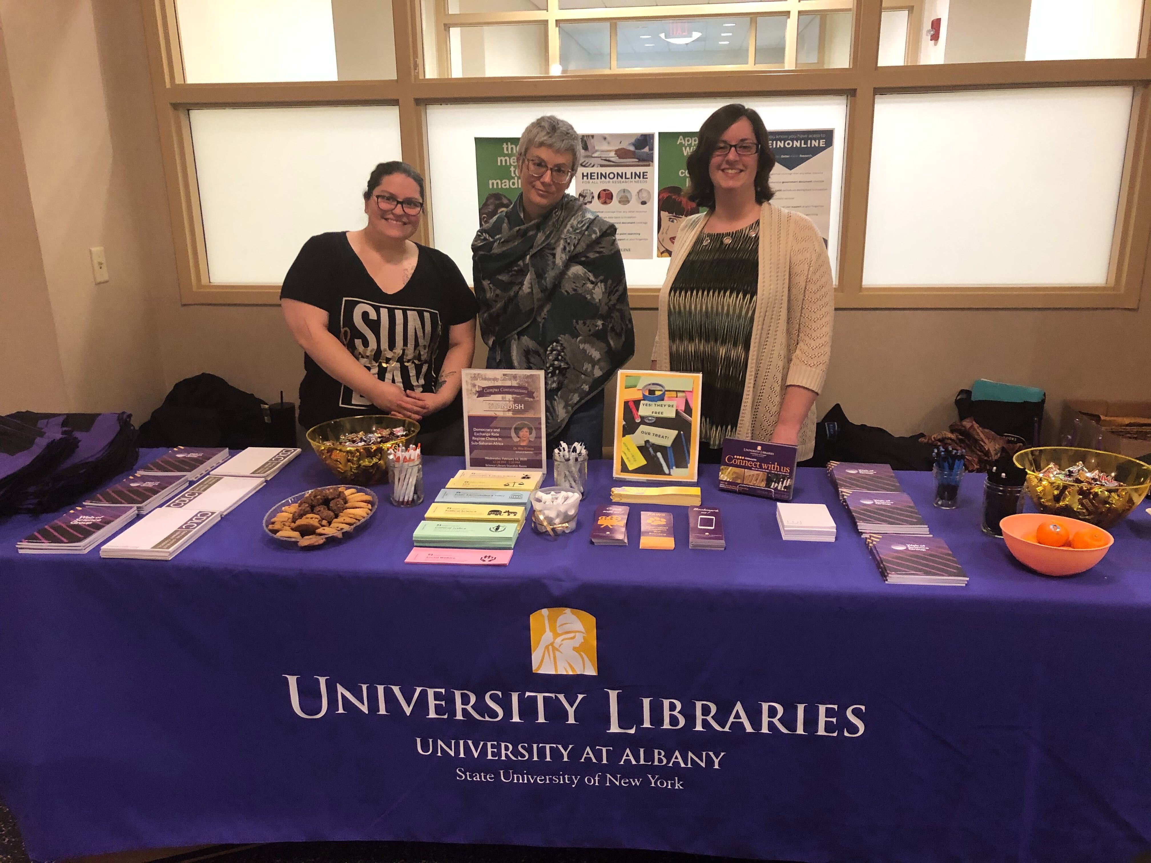 Staff members table at the Dewey Welcome Back Event