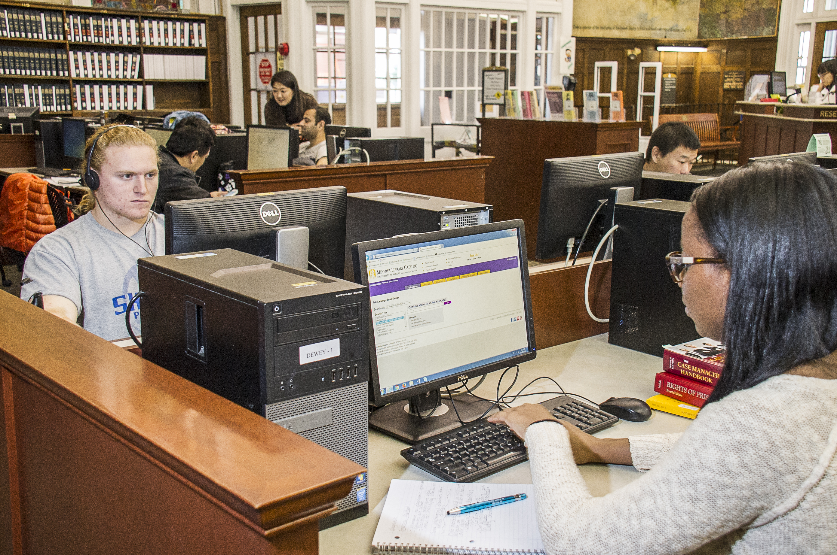 Students using computers in Dewey library