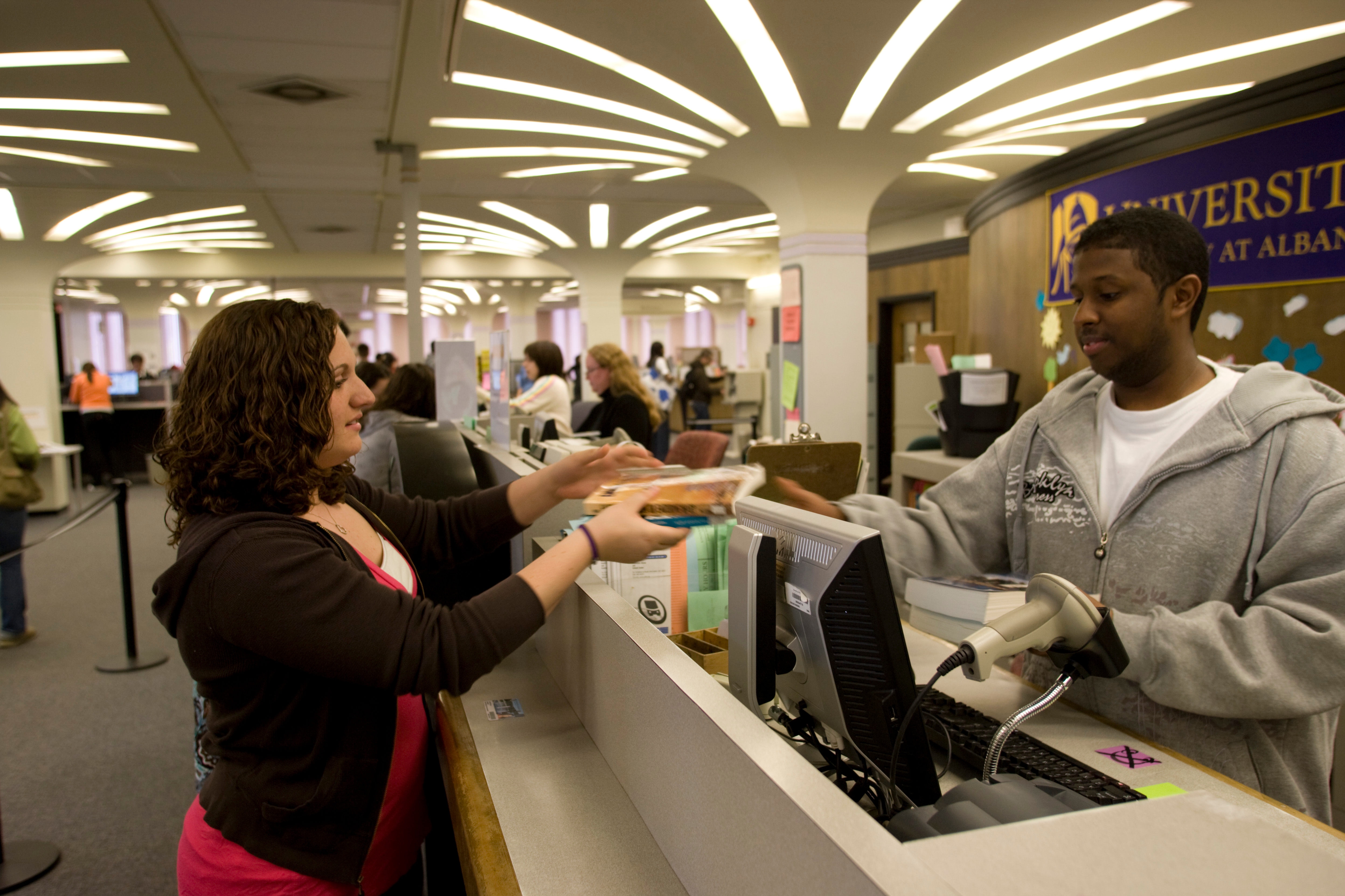 borrowing book from circulation desk