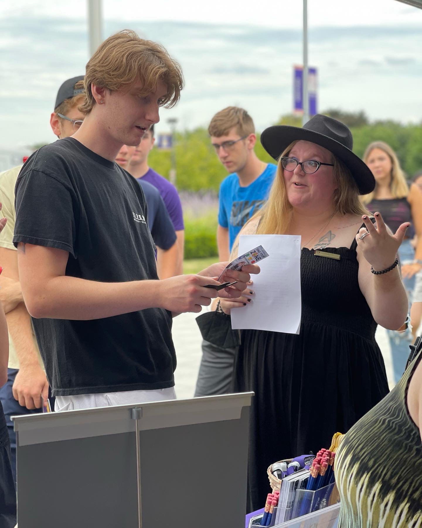 A student (left) speaking with Amanda Lowe (right) at Great DANEtopia