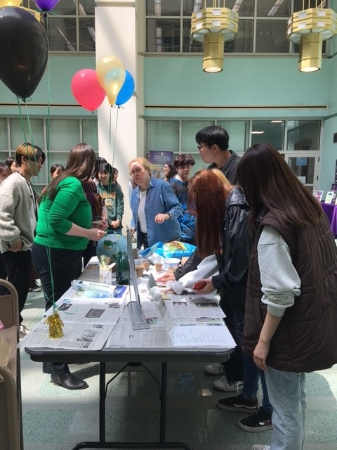 Students attending the Earth Day Celebration in the Science Library