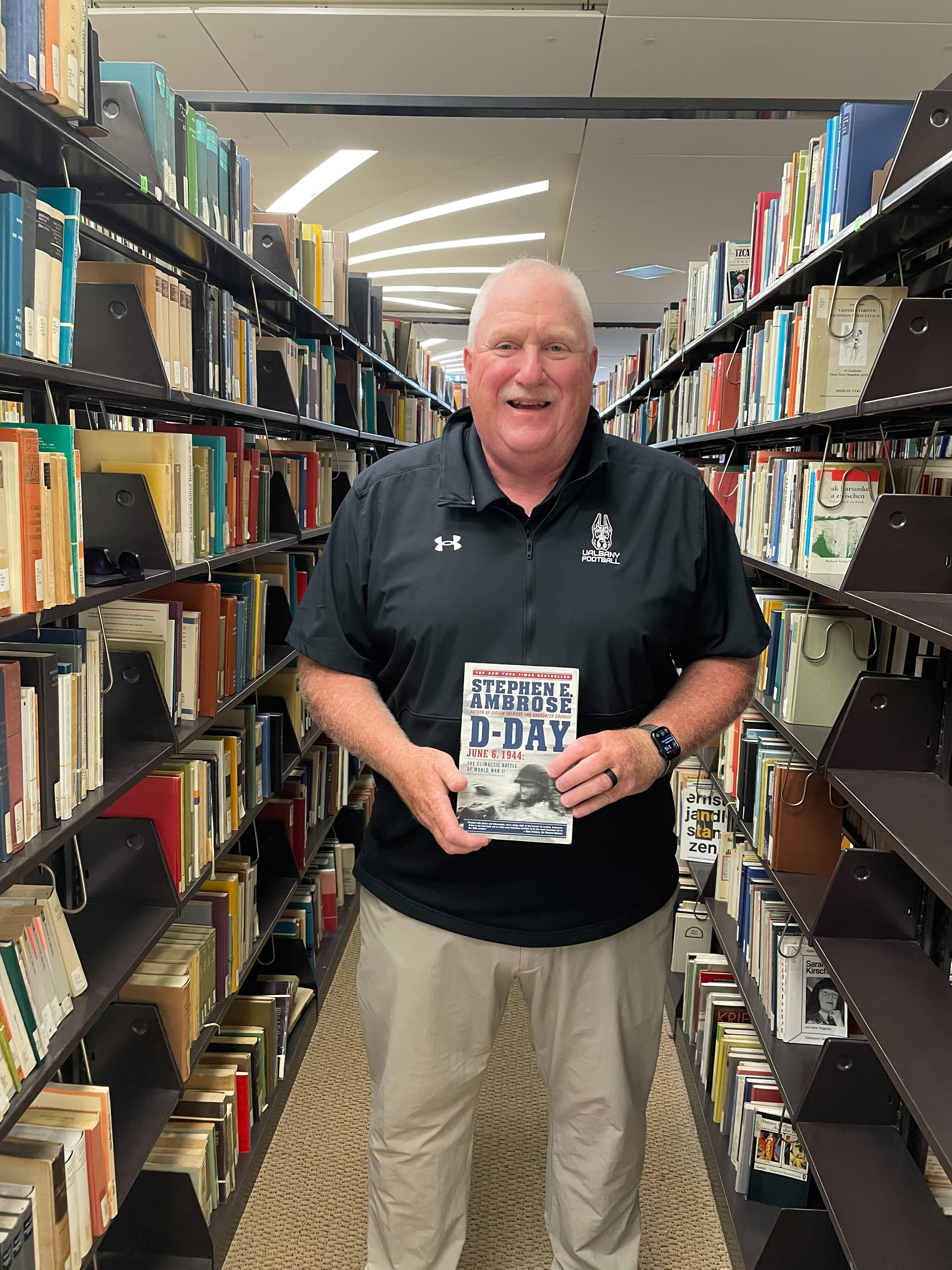 Coach Gattuso with D-Day by Stephen Ambrose