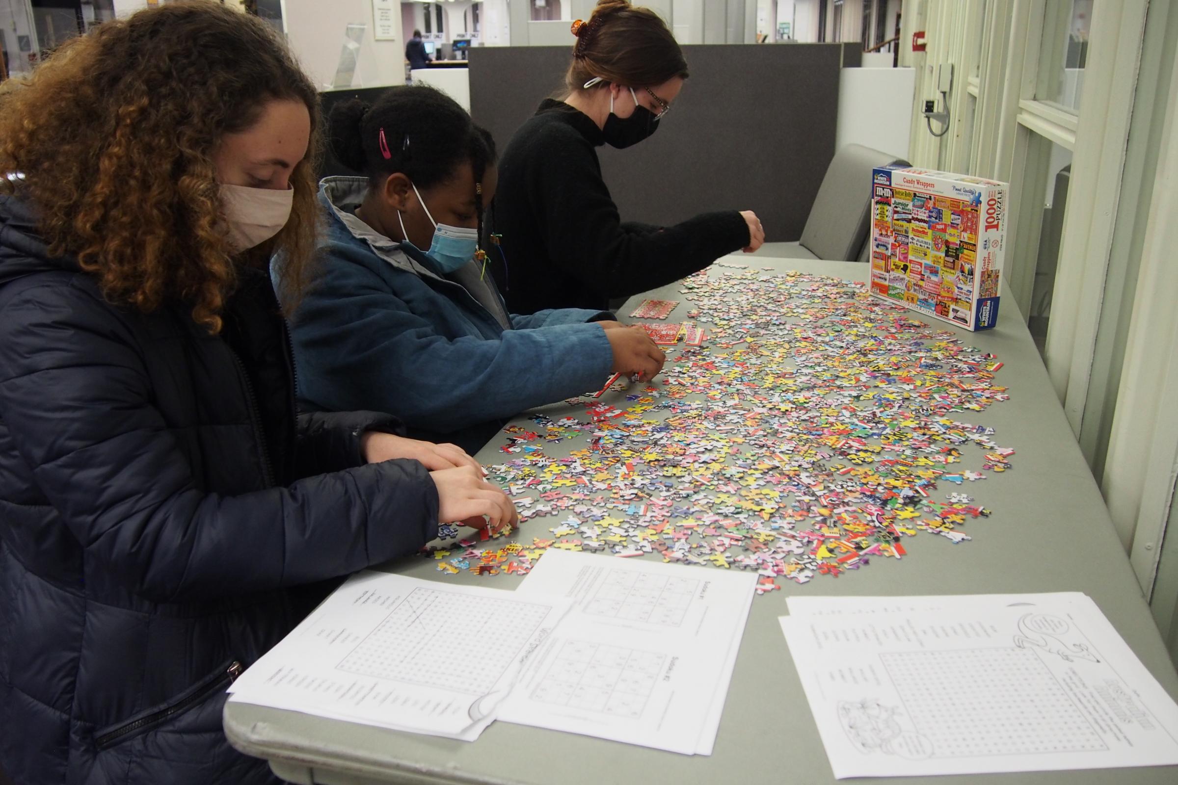 Students work at the Puzzle Corner