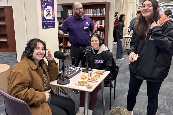 students try out podcasting equipment at the Framing The Future Event 24