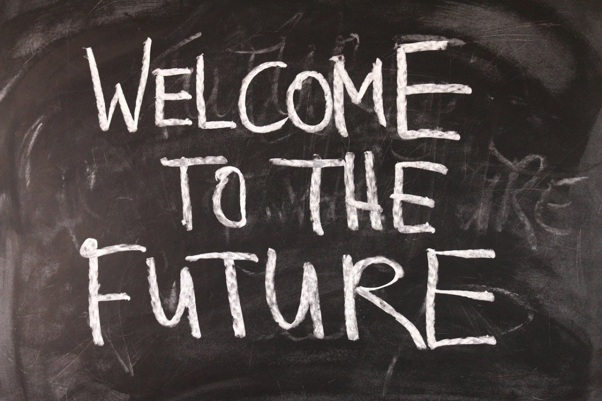 A blackboard with the message "Welcome to the Future" written in white chalk