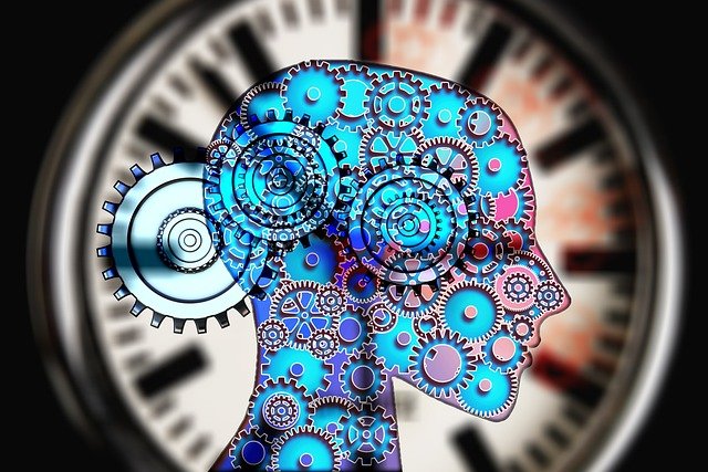 A blue and purple silhouetted face over a clock with gears